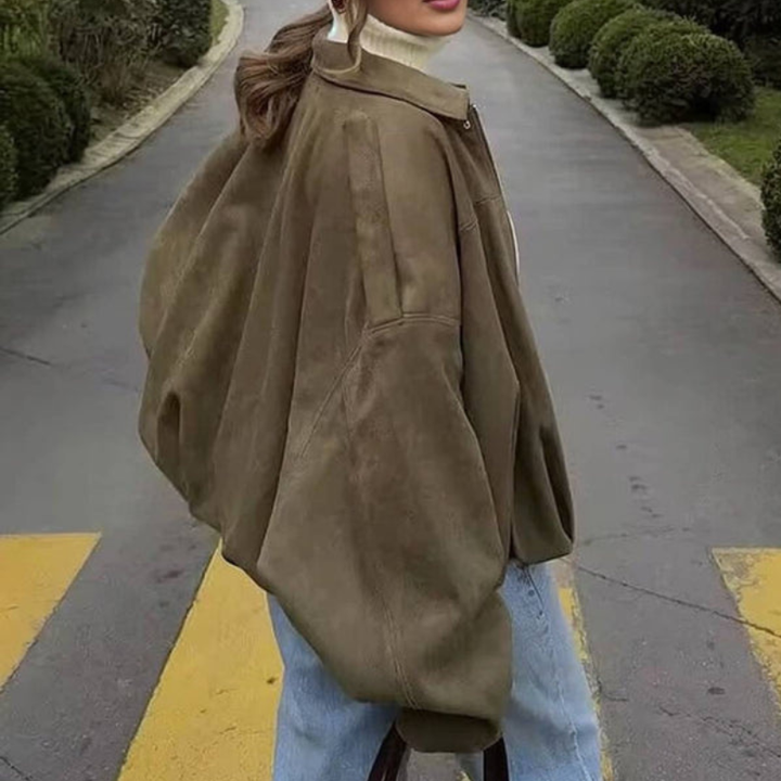 Stylowa krótka kurtka damska z luźnym krojem i guzikiem