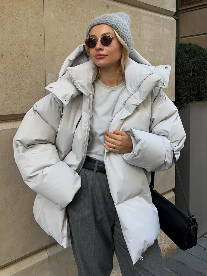 Stylowa kurtka puchowa damska w oversize z kapturem